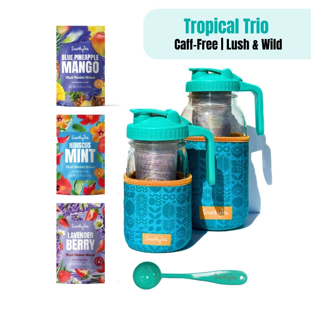 Tropical Trio product set with jars, 3 packets of tea: Blue Pineapple Mango, Hibiscus Mint, Lavender Berry and a teal spoon on a white background - Caff-free, Lush & Wild