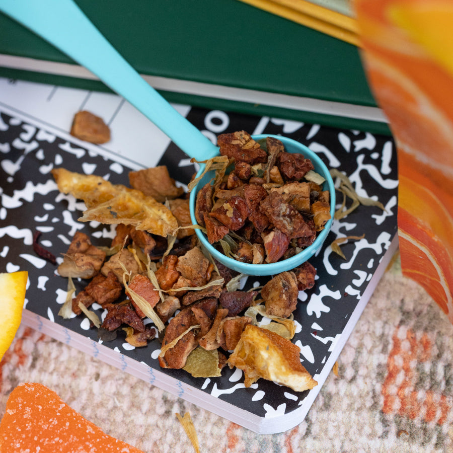 Snarky Tea 60g Candied Orange fruit herbal blend packaging with colorful design on a white background