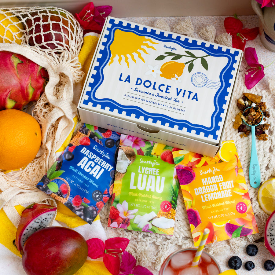 A whitebox photo of the la dolce vita sampler, consisting of Raspberry Acai, Strawberry Orange, Sweet Pineapple, Mango Dragonfruit Lemonade, Lychee Luau, Orange Blossom, Peaches & Cream, and Mango Pineapple Paradise in 20g bags