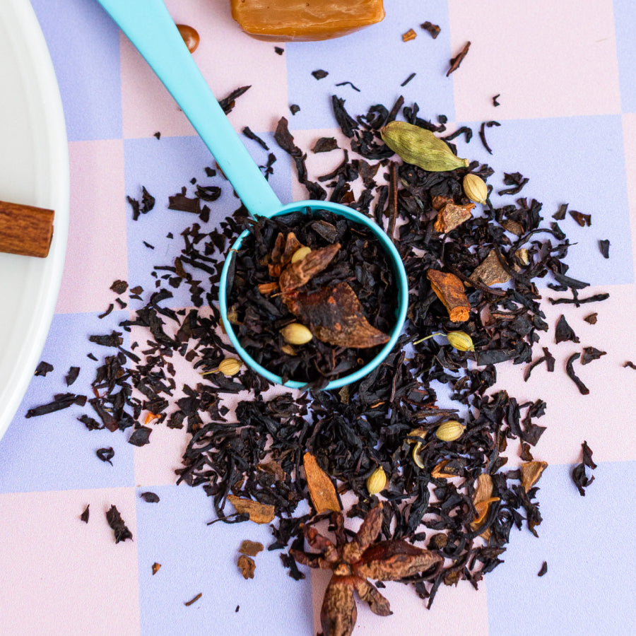 Snarky Tea 60g Spiced Caramel Latte black tea blend packaging with colorful design on a white background