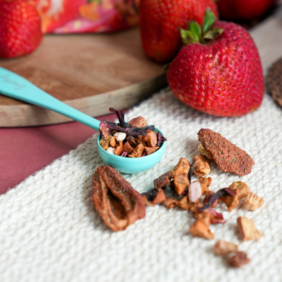 Snarky Tea Packaging 60G of Strawberry Crumble fruit herbal blend on a white background